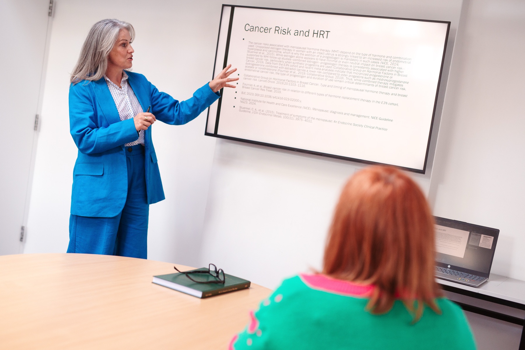 Ruth presenting on cancer risk and HRT to a colleague